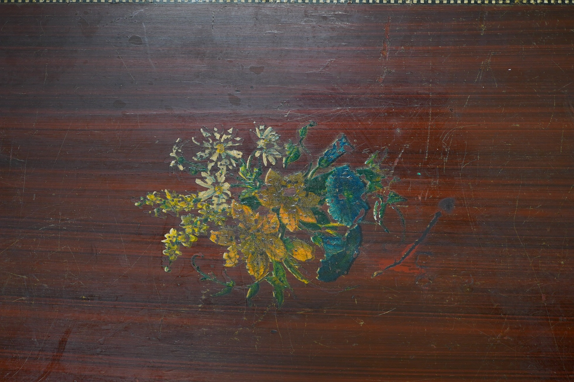 A decoratively painted Swiss music box playing eight airs, 49cm wide x 22cm high. Condition - case fair, mechanism appears in good order.